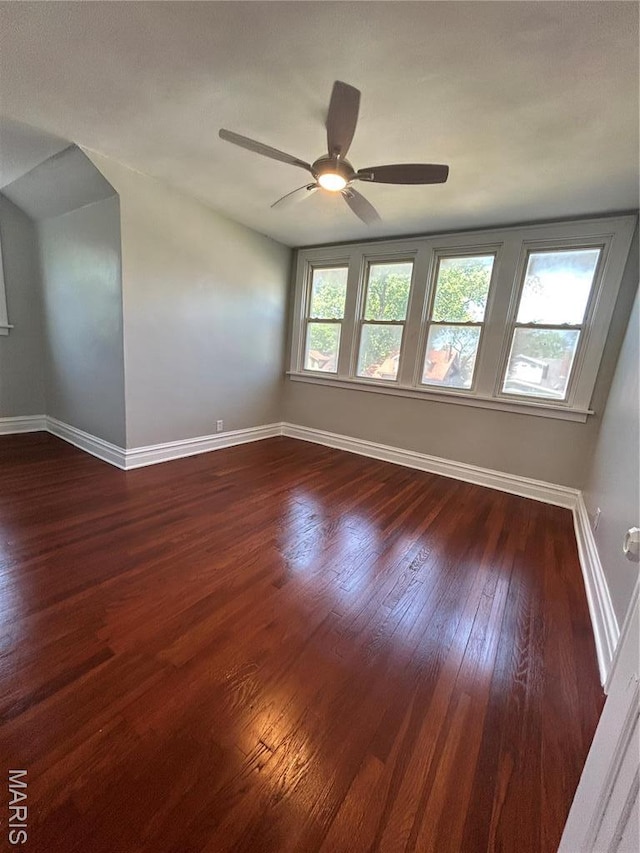 3604 Ridgedale Ave, Saint Louis, MO 63121 - unfurnished room with dark wood-style floors, baseboards, and ceiling fan