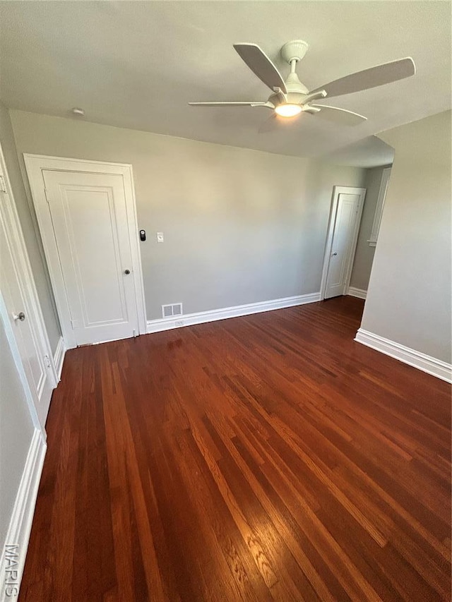 3604 Ridgedale Ave, Saint Louis, MO 63121 - spare room with wood finished floors, ceiling fan, and baseboards