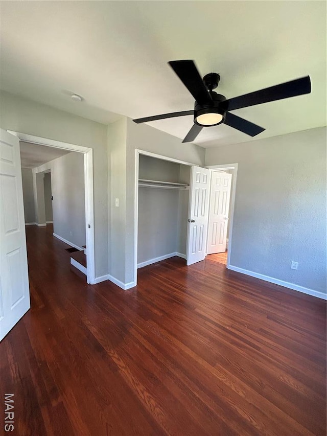 3604 Ridgedale Ave, Saint Louis, MO 63121 - unfurnished bedroom with baseboards, wood finished floors, a closet, and a ceiling fan