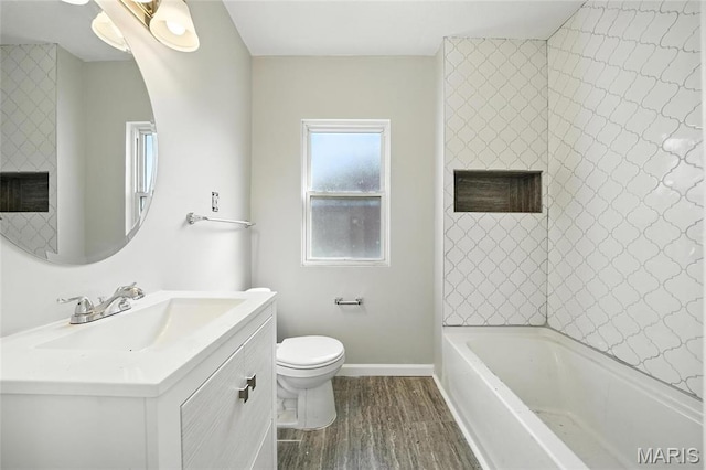 3604 Ridgedale Ave, Saint Louis, MO 63121 - full bath featuring a fireplace, vanity, wood finished floors, and shower / tub combination