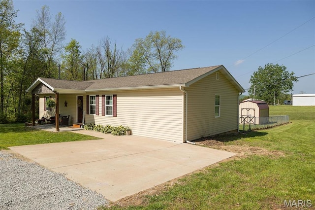 2962 Sherrill Rd, Doe Run, MO 63637 - single story home with a storage shed, a front lawn, an outbuilding, driveway, and a porch