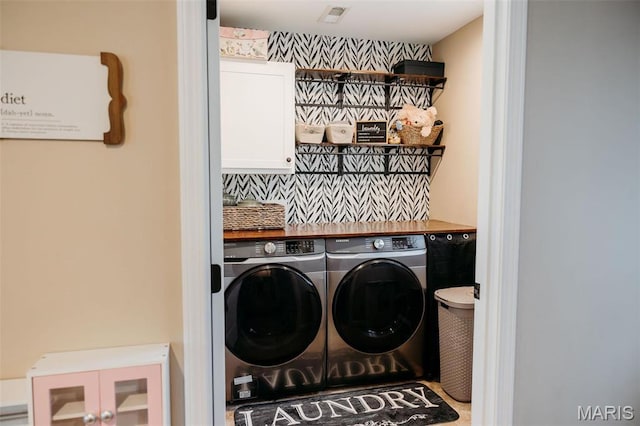 2962 Sherrill Rd, Doe Run, MO 63637 - clothes washing area with washer and dryer and cabinet space