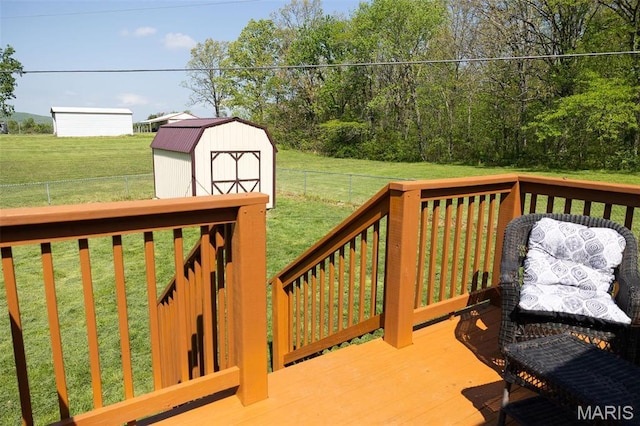 2962 Sherrill Rd, Doe Run, MO 63637 - wooden terrace with a storage unit and an outbuilding