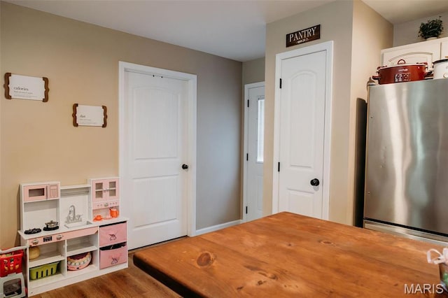 2962 Sherrill Rd, Doe Run, MO 63637 - rec room with wood finished floors and baseboards
