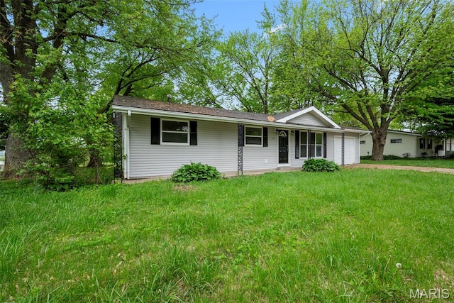 210 Scenic Dr, Elsberry, MO 63343 - view of front facade with a garage and concrete driveway