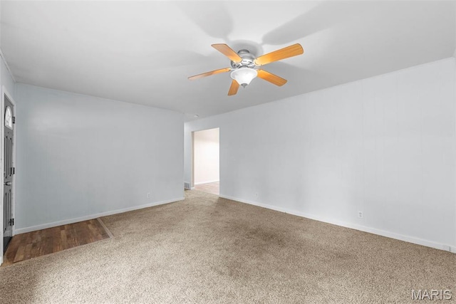 210 Scenic Dr, Elsberry, MO 63343 - unfurnished room with carpet, a ceiling fan, and baseboards