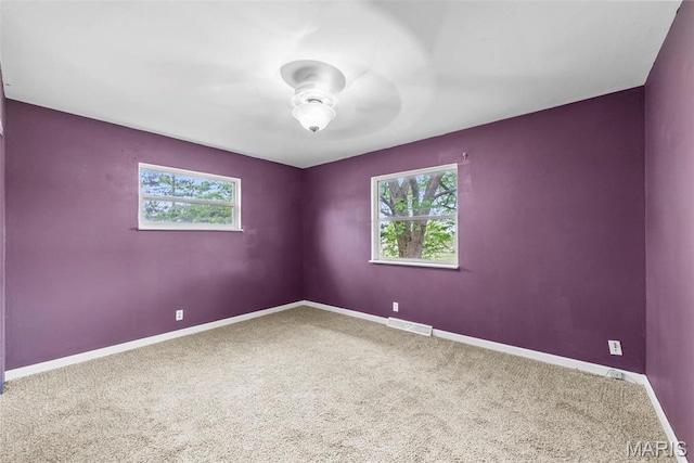 210 Scenic Dr, Elsberry, MO 63343 - carpeted spare room featuring ceiling fan and baseboards