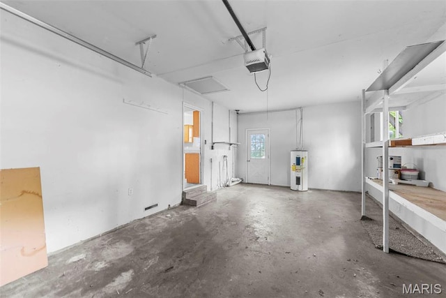 210 Scenic Dr, Elsberry, MO 63343 - garage with electric water heater and a garage door opener