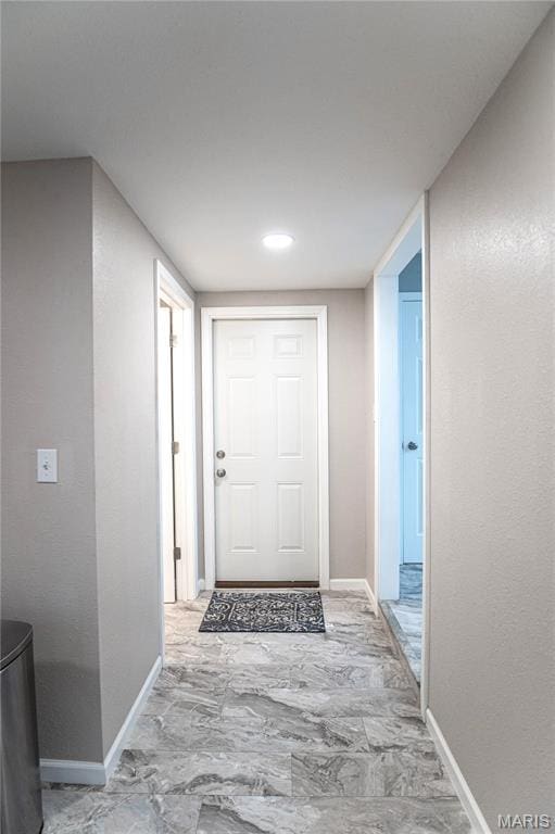 415 W James Blvd, St James, MO 65559 - hall with baseboards and marble finish flooring