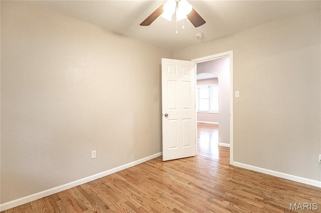 415 W James Blvd, St James, MO 65559 - empty room featuring light wood-type flooring, baseboards, ceiling fan, and a smoke detector