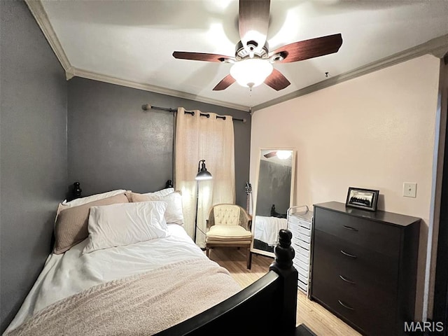 1816 N 22nd St, Springfield, IL 62702 - bedroom with crown molding, light wood-style flooring, and a ceiling fan