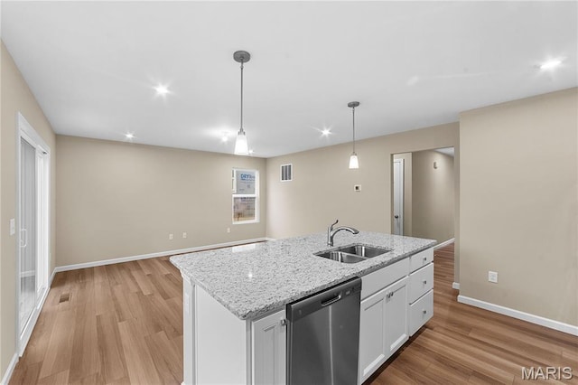 317 Newbridge Way, Ofallon, MO 63368 - kitchen with dishwasher, a sink, light wood-type flooring, baseboards, and recessed lighting