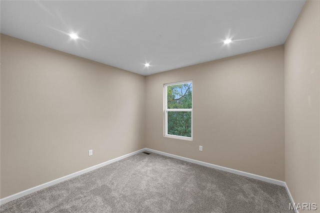 317 Newbridge Way, Ofallon, MO 63368 - carpeted empty room with baseboards and recessed lighting