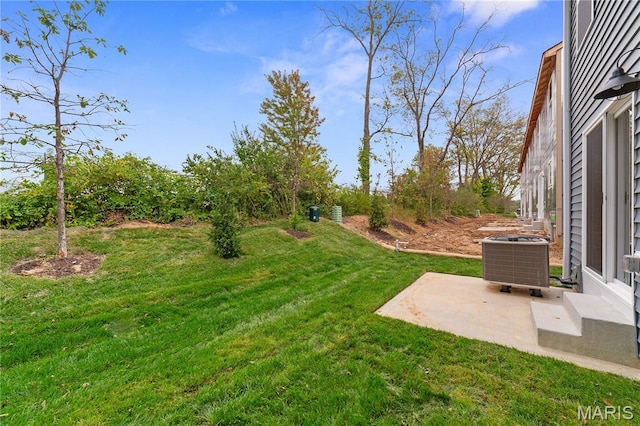 317 Newbridge Way, Ofallon, MO 63368 - view of green lawn featuring central AC and a patio