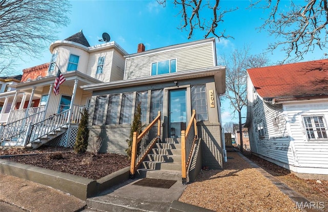 204 S 3rd St, De Soto, MO 63020 - rear view of house featuring stairs