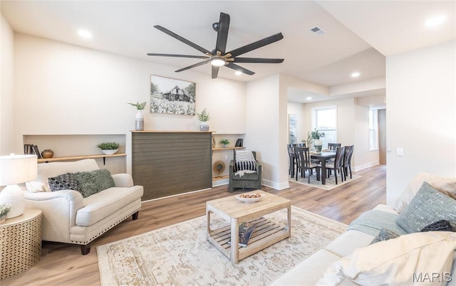 204 S 3rd St, De Soto, MO 63020 - living room featuring ceiling fan, recessed lighting, wood finished floors, and baseboards