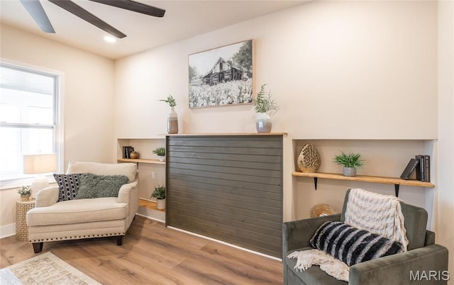 204 S 3rd St, De Soto, MO 63020 - sitting room with wood finished floors, ceiling fan, recessed lighting, and baseboards