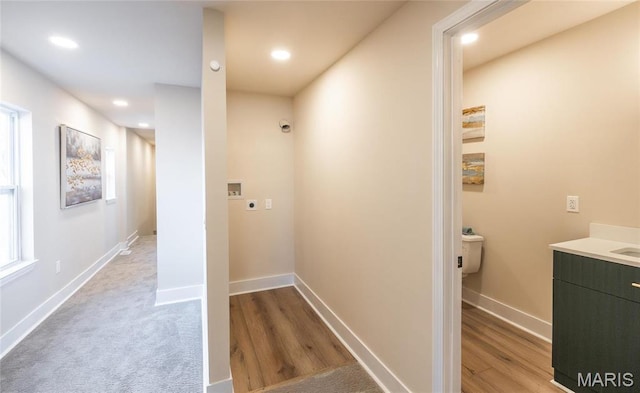 204 S 3rd St, De Soto, MO 63020 - hallway featuring recessed lighting, light wood finished floors, and baseboards
