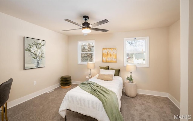 204 S 3rd St, De Soto, MO 63020 - carpeted bedroom featuring baseboards and ceiling fan
