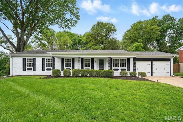 single story home featuring an attached garage, driveway, a front yard, and a porch