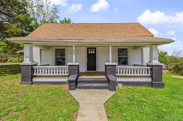 608 W Main St, Park Hills, MO 63601 - bungalow featuring a porch, a front yard, and a shingled roof