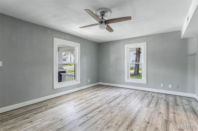608 W Main St, Park Hills, MO 63601 - empty room with ceiling fan, wood finished floors, and baseboards