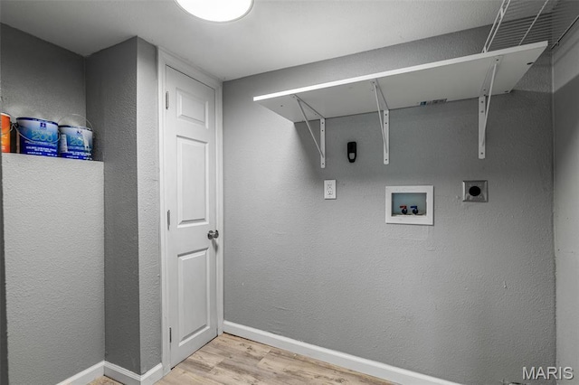 608 W Main St, Park Hills, MO 63601 - clothes washing area featuring light wood-style flooring, hookup for a washing machine, baseboards, and hookup for an electric dryer
