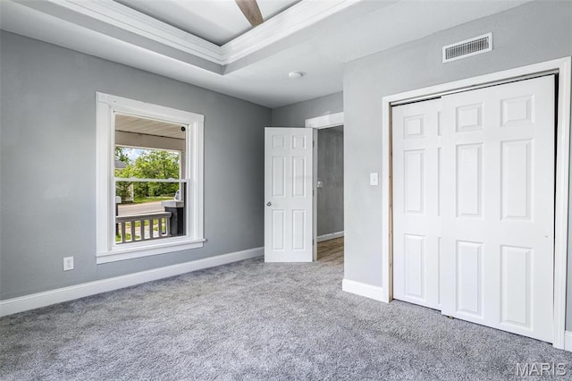 608 W Main St, Park Hills, MO 63601 - unfurnished bedroom featuring carpet, baseboards, a closet, and a raised ceiling