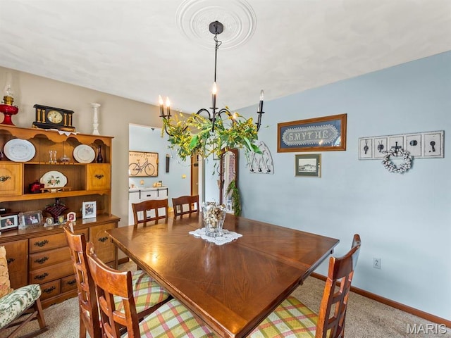 2700 Woods Way, Belleville, IL 62221 - dining space with carpet, a chandelier, and baseboards