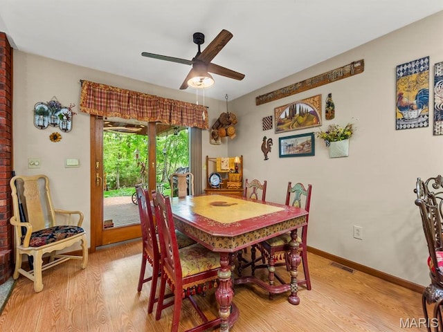 2700 Woods Way, Belleville, IL 62221 - dining room with light wood-style flooring, ceiling fan, and baseboards