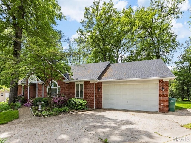 2700 Woods Way, Belleville, IL 62221 - view of front of home featuring brick siding, driveway, and an attached garage