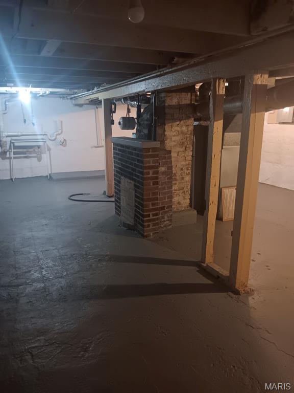 2326 Edwards St, Granite City, IL 62040 - unfinished below grade area featuring a brick fireplace