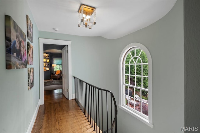 20 Picardy Ln, Ladue, MO 63124 - corridor featuring wood finished floors, baseboards, and an upstairs landing
