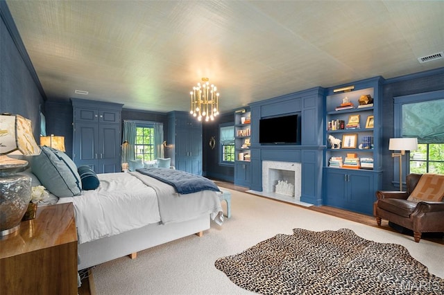 20 Picardy Ln, Ladue, MO 63124 - bedroom with a fireplace with flush hearth and a chandelier
