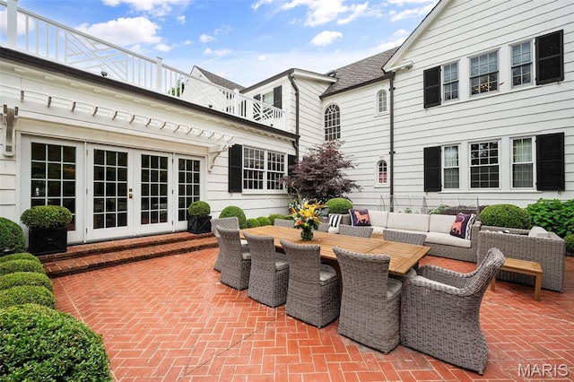 20 Picardy Ln, Ladue, MO 63124 - view of patio / terrace with french doors, outdoor dining area, a balcony, and an outdoor living space
