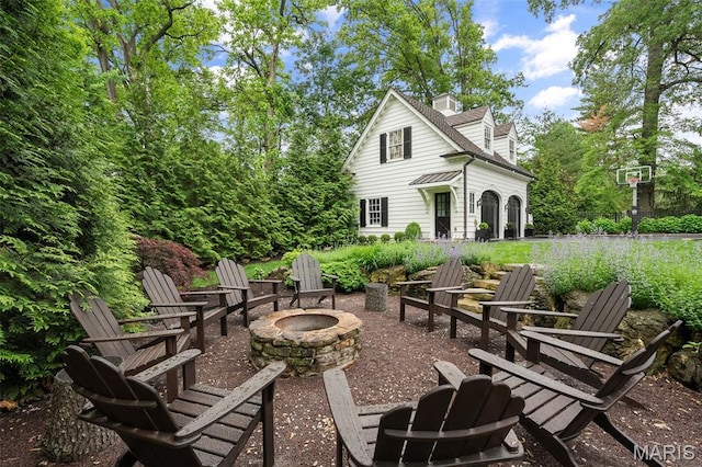 20 Picardy Ln, Ladue, MO 63124 - view of patio with an outdoor fire pit