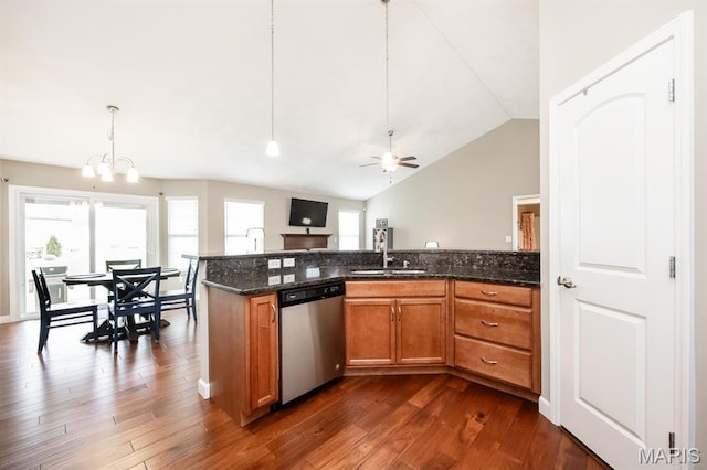 9722 Quapaw Ct, Mascoutah, IL 62258 - kitchen featuring stainless steel dishwasher, a sink, brown cabinetry, dark wood-type flooring, and pendant lighting