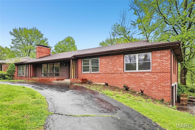 18 Spoede Hills Dr, Saint Louis, MO 63141 - ranch-style home featuring driveway, brick siding, and a chimney