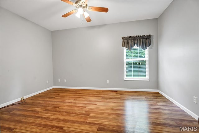 1587 Paradise Valley Dr, High Ridge, MO 63049 - spare room with ceiling fan and wood finished floors