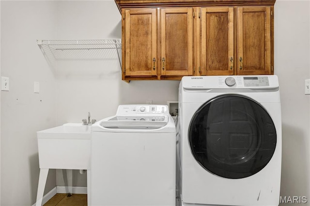 1587 Paradise Valley Dr, High Ridge, MO 63049 - washroom featuring cabinet space and independent washer and dryer