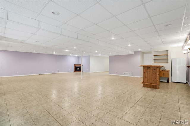 1587 Paradise Valley Dr, High Ridge, MO 63049 - unfurnished living room with a paneled ceiling and recessed lighting