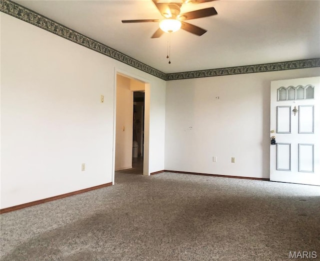 603 W Bloomfield Ave, Bloomfield, MO 63825 - carpeted empty room with a ceiling fan and baseboards