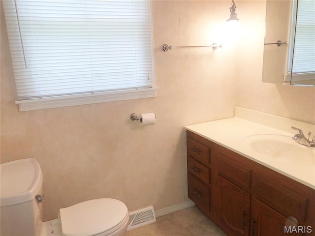 603 W Bloomfield Ave, Bloomfield, MO 63825 - half bathroom featuring toilet and vanity