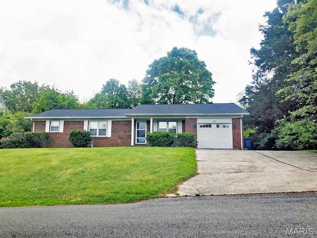 603 W Bloomfield Ave, Bloomfield, MO 63825 - ranch-style home featuring an attached garage, concrete driveway, brick siding, and a front yard