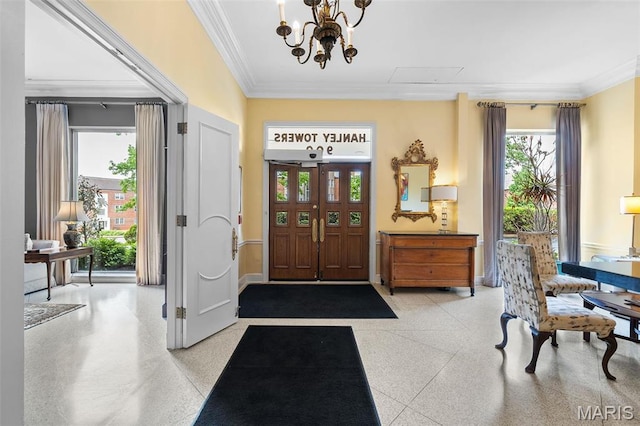 900 S Hanley Rd Unit 7B, Saint Louis, MO 63105 - foyer featuring ornamental molding, a chandelier, and baseboards