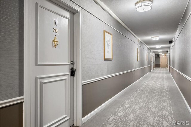 900 S Hanley Rd Unit 7B, Saint Louis, MO 63105 - corridor featuring baseboards