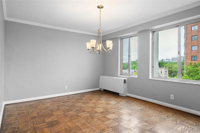 900 S Hanley Rd Unit 7B, Saint Louis, MO 63105 - spare room featuring radiator heating unit, baseboards, a chandelier, and crown molding