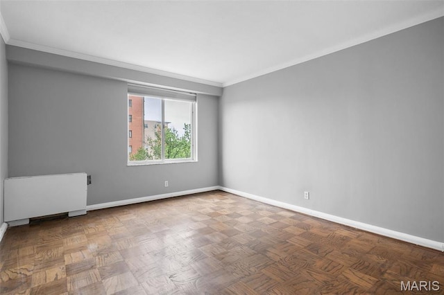 900 S Hanley Rd Unit 7B, Saint Louis, MO 63105 - unfurnished room featuring radiator, ornamental molding, and baseboards