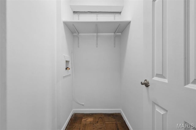 900 S Hanley Rd Unit 7B, Saint Louis, MO 63105 - laundry room with baseboards