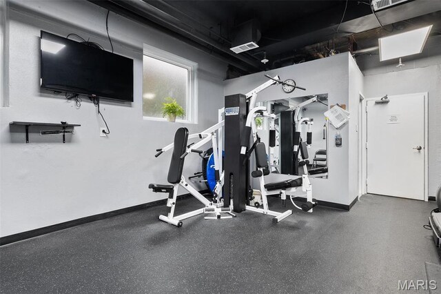 900 S Hanley Rd Unit 7B, Saint Louis, MO 63105 - workout area with baseboards